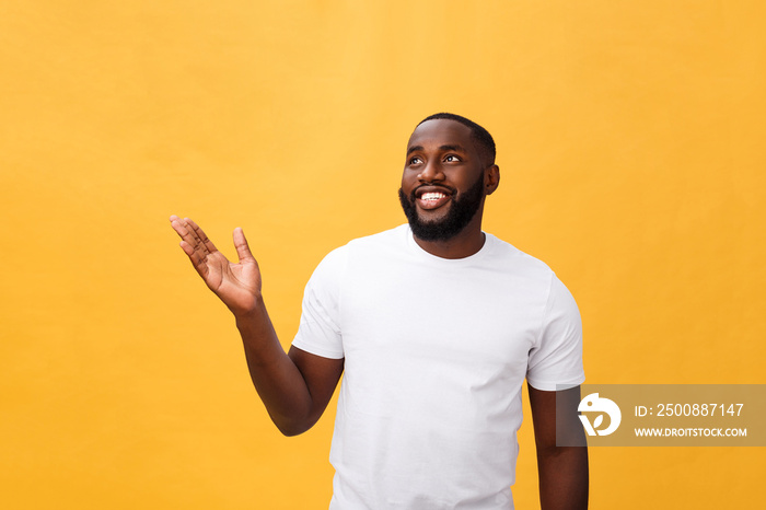 African american man with beard showing hand away side isolated over yellow background