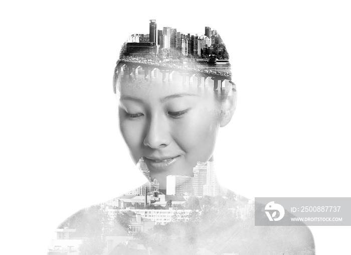 Triple exposure of young Asian woman and modern city