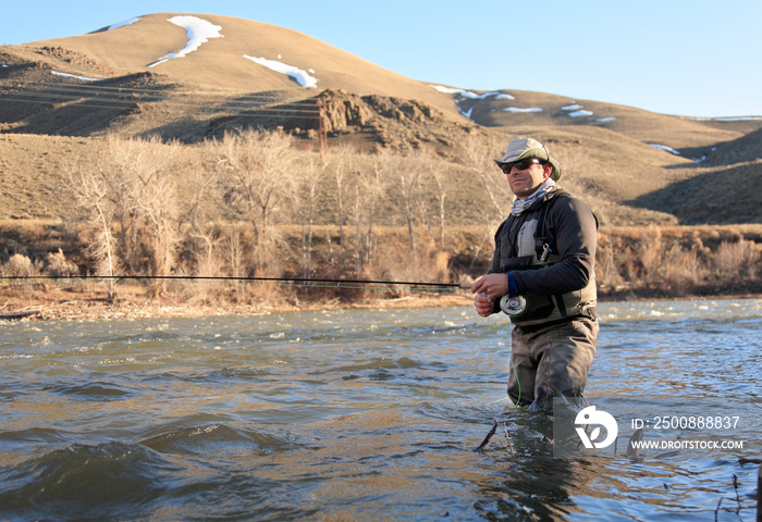 fly fisherman fishing on the Salmon River in Idaho, USA