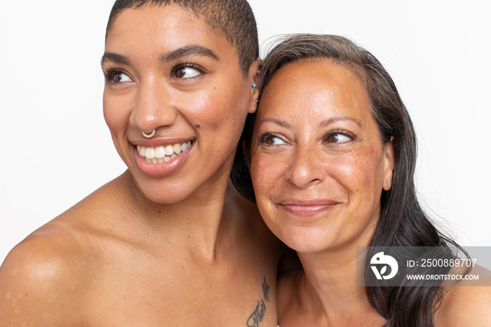 Studio portrait of smiling women