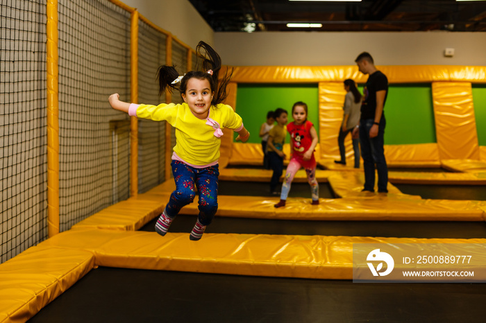 Children playing on a inflatable trampoline