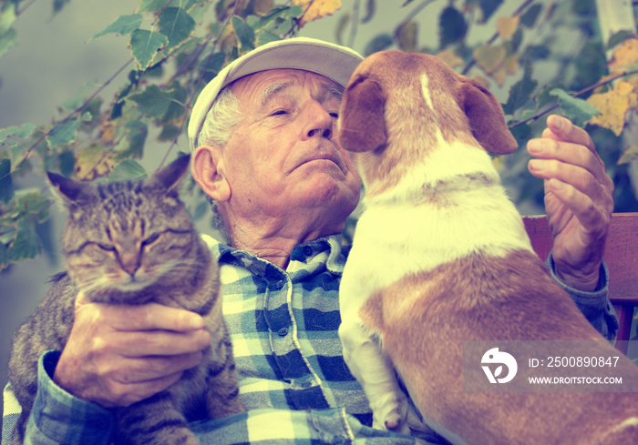 Senior man with pets