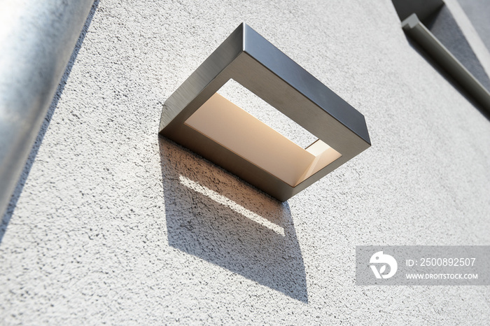 Exterior wall light on renovated plaster structure