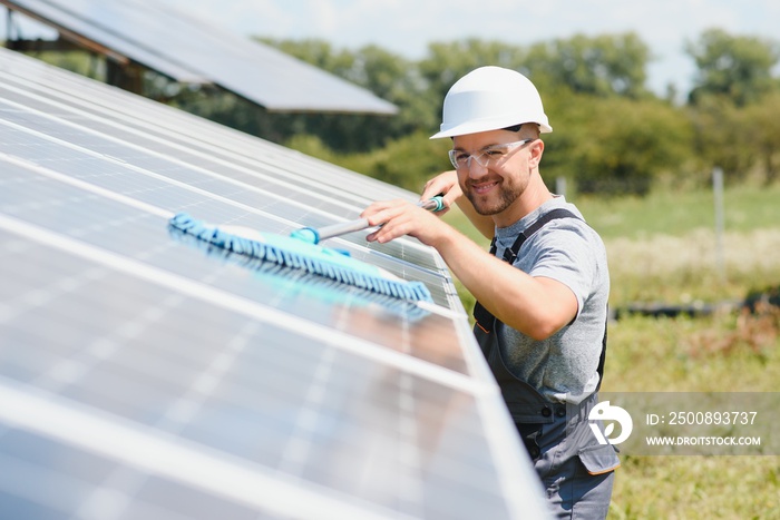 man cleaning, solar power washing