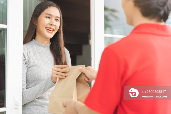 Postman, service fast food asian young woman, girl hand received order, delivery man, male holding, carrying paper bag send to customer house. Courier bring product, takeaway to door, express grocery.