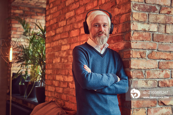 Portrait of an old man with a gray beard.