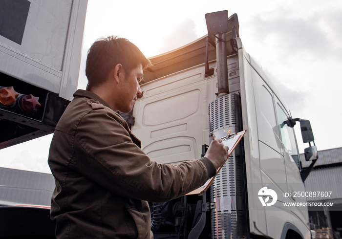 Asian Truck Driver is Checking the Semi Truck’s Engine Maintenance Checklist. Lorry Driver. Inspection Truck Safety Driving. Shipping Cargo Freight Truck Transport.