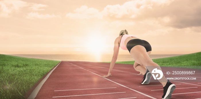 Composite image of female athlete on the start line