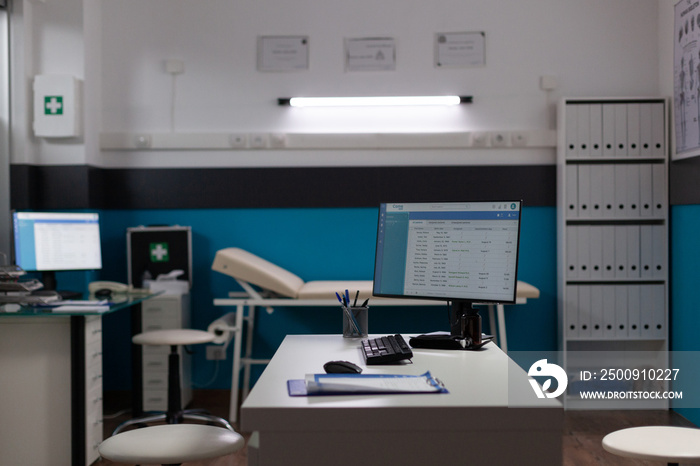 Empty hospital office with nobody in it having modern furniture ready for healthcare service. Medica