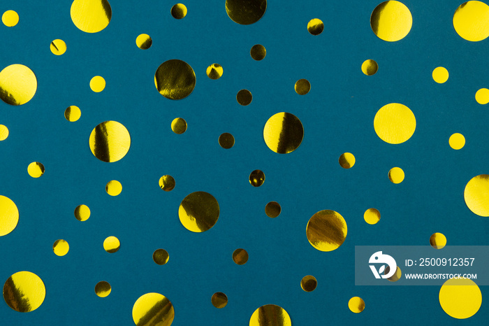 Yellow gold metallic confetti dots on classic blue background.