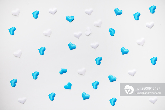 white and blue hearts isolated on white background. confetti concept valentines day background