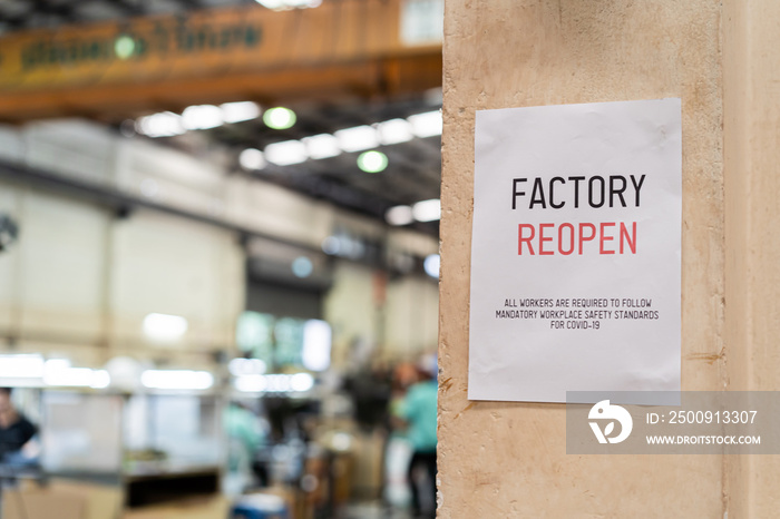 Factory Reopen sign inside the factory warehouse after shutting down affected by Coronavirus Covid-1