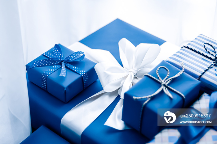 Holiday gifts and wrapped luxury presents, blue gift boxes as surprise present for birthday, Christm