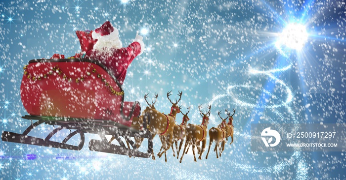 Composition of santa claus in sleigh pulled by reindeer with snow falling on blue background