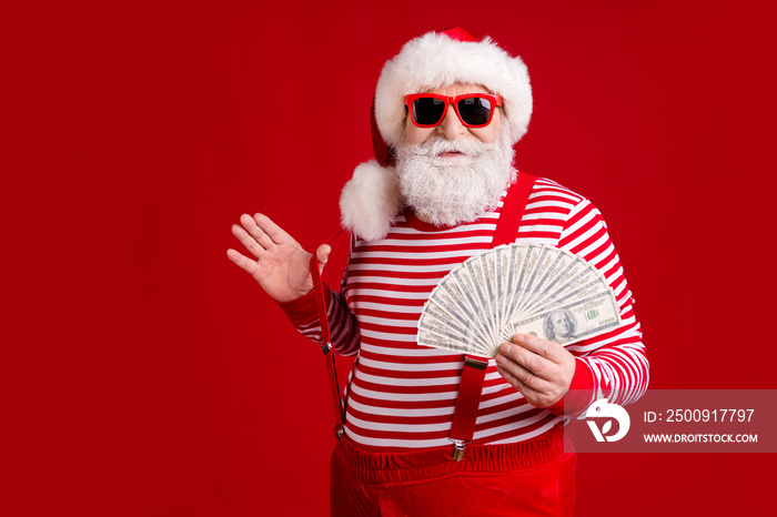 Photo of retired grandpa grey beard hold money cash fan play strap empty space prepare trip tropics 
