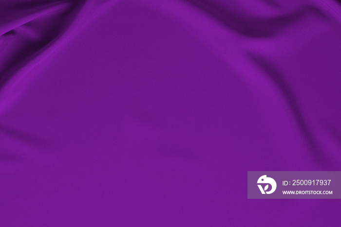 Purple silk or satin luxury fabric texture can use as abstract background.