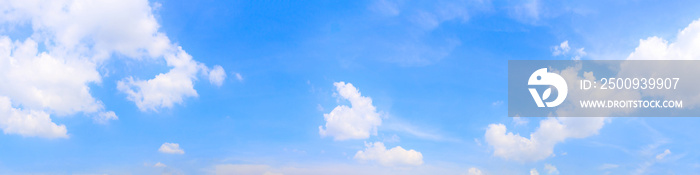 Panorama or panoramic photo of blue sky and white clouds or cloudscape. breathing concepts for billboard backdrop or background.