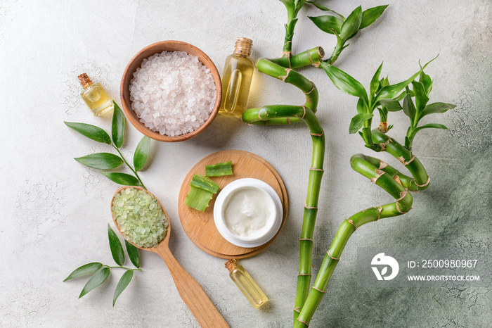 Beautiful spa composition with cosmetics on light background