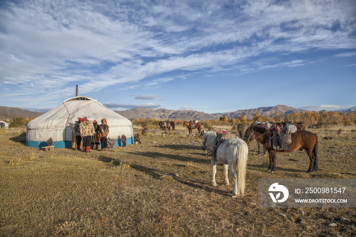 Eagle Hunters getting ready to attend the Golden Eagle Festival, Mongolia