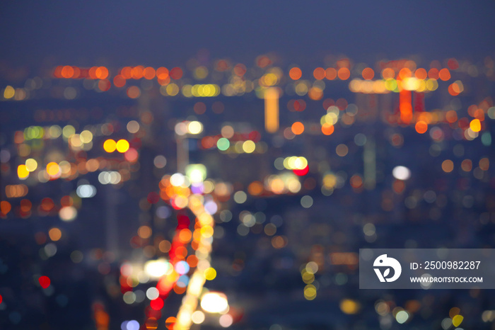 Blurred background with a view of city lights at night. Abstract blurred bokeh city light at night.