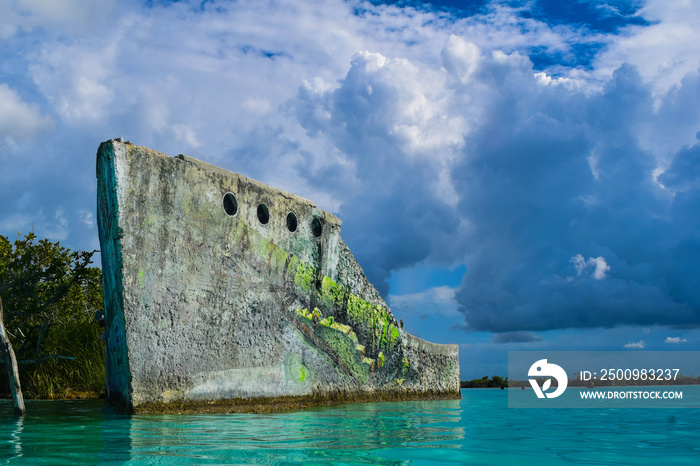 Landscape with the boat of Bacalar Quintana Roo, Mexico between the blue of its lagoon and the sky