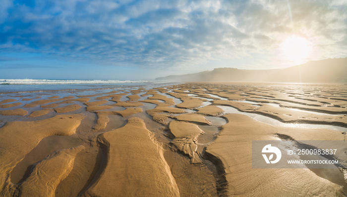 Watergate Beach at sunrise in Cornwall. UK