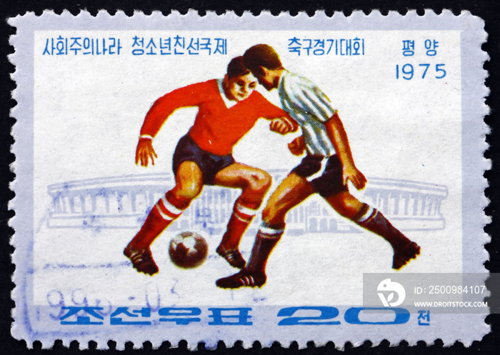 Postage stamp North Korea 1975 soccer players in action