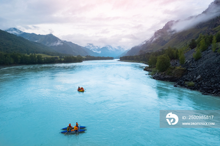 Team extreme rafting on red boat on stormy blue river Altai, Aerial top view. Concept adventure travel