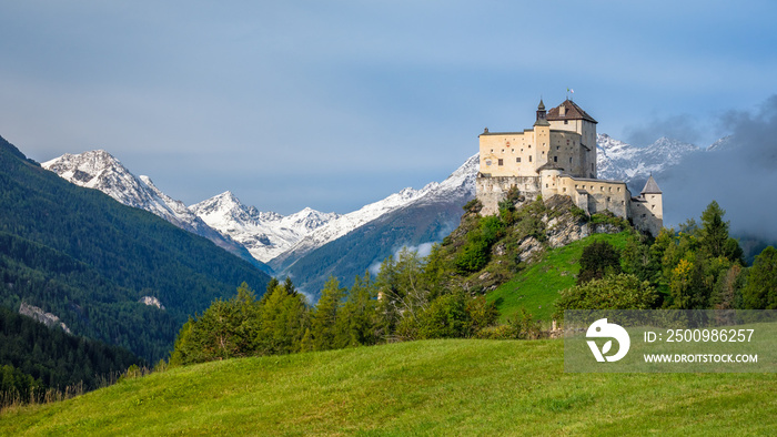 Mountains surrounding Tarasp castle, in the canton of Graubünden (Engadin) Switzerland. Tarasp is a village in Graubünden, Switzerland.  The castle is a Swiss heritage site of national significance