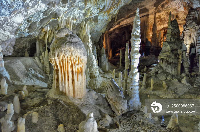 under the ground. beautiful view of stalactites and stalagmites in an underground cavern - Postojna cave, Slovenia, Europe