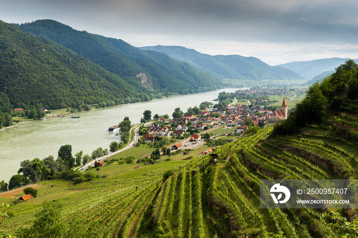 Scenic View into the Wachau with the river Danube and town Weissenkirchen in Lower Austria.