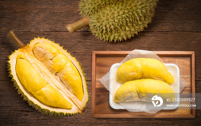 Durian the King of fruits, Durian fruit  on wooden background.durian fruit with delicious golden yellow soft flesh