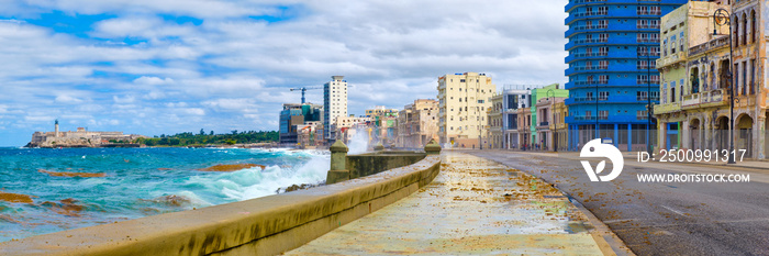 The Havana skyline and the iconic Malecon seawall with a stormy ocean