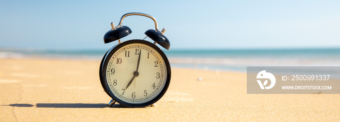 Alarm clock on the beach