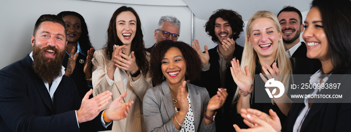 Diverse ethnicity group of colleagues clapping hands congratulating and exult for good results. Horizontal banner or header.