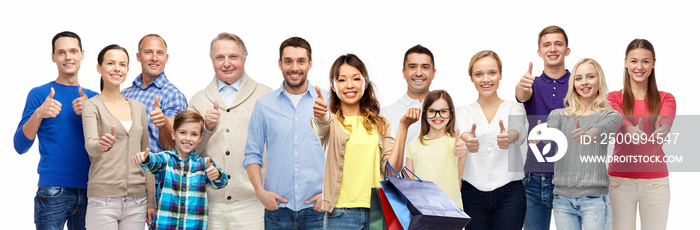 sale, outlet and consumerism concept - asian woman with shopping bags and group of people of different ages showing thumbs up over white background