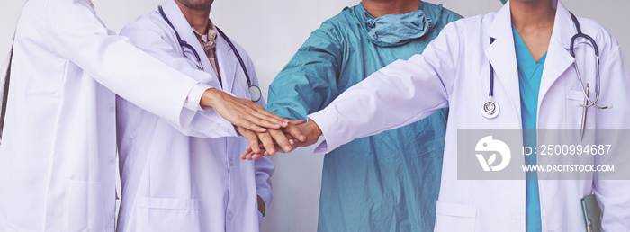 Doctors and Nurses coordinate hands. Concept Teamwork