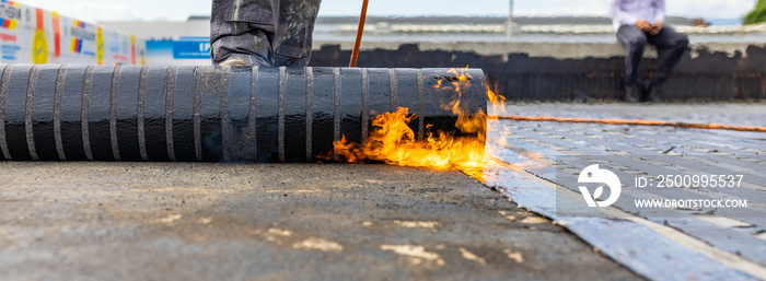 Bituminous membrane waterproofing system details and installation on flat rooftop.