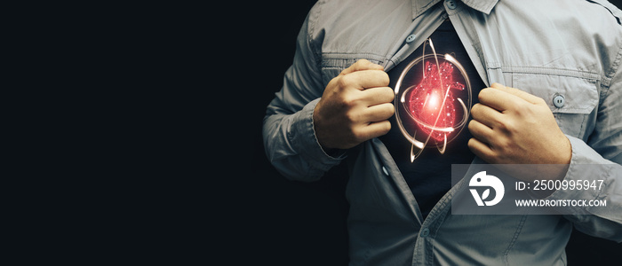 Business man in shirt with a picture neon red heart and atom. Innovative technologies.