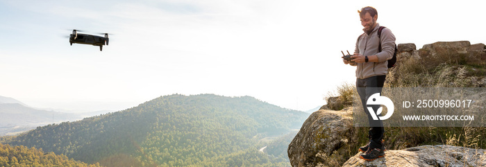 Banner of a Man flying drone