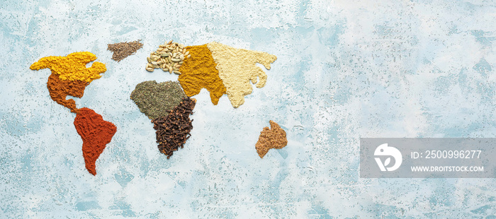 World map made of spices on light blue background with space for text