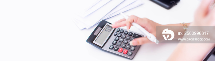 Banner of hand and calculator on white table