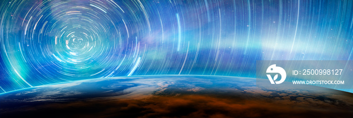 Long exposure of night sky star trail over the Planet Earth with aurora borealis  Elements of this image furnished by NASA