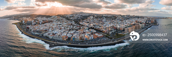 Panoramic aerial view of Las Palmas de Gran Canaria and Las Canteras beach at sunset, Canary Islands, Spain.