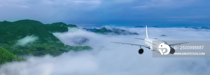 airplane flying over mountains