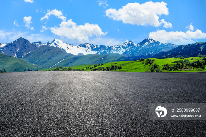 Asphalt road and beautiful mountain natural scenery in Xinjiang, China.