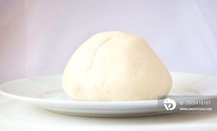 Pounded yam / semo on a white plate