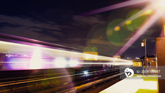 High Speed City Metro Rail With Light Streaks In Urban Setting