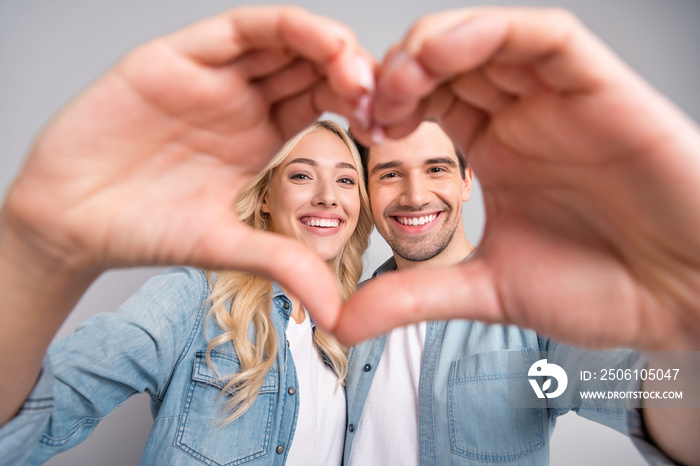 Photo of young couple happy positive smile show fingers heart figure love romantic isolated over gre