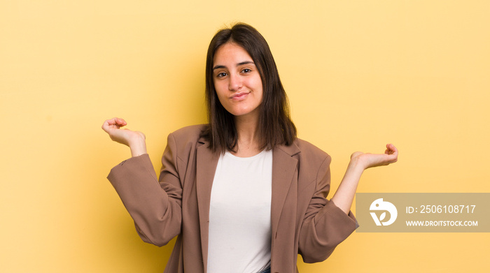 young hispanic woman feeling puzzled and confused, doubting, weighting or choosing different options